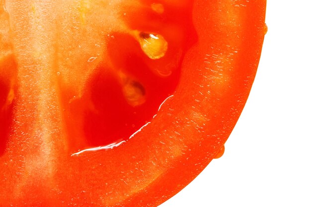 Tomato macro photo, a bright colorful vegetable in the section