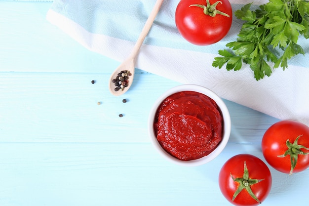 Tomato paste on the table top view tomato sauce