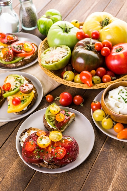 Tomato sandwich made with organic heirloom tomatoes.