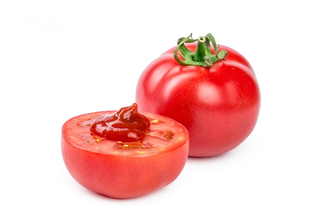 tomato sauce, ketchup on a sliced tomato isolated