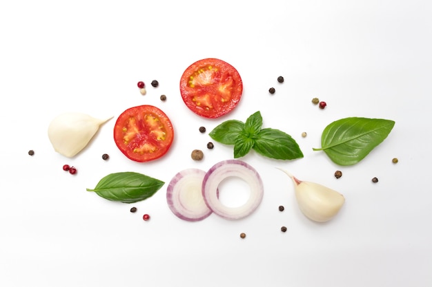 tomato slices purple onion rings fresh basil leaves garlic and allspice