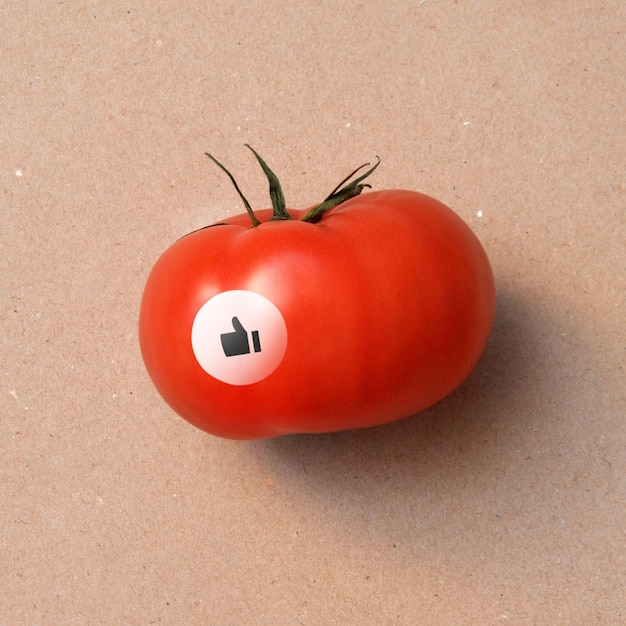 A tomato with a thumbs up sticker Great tomato