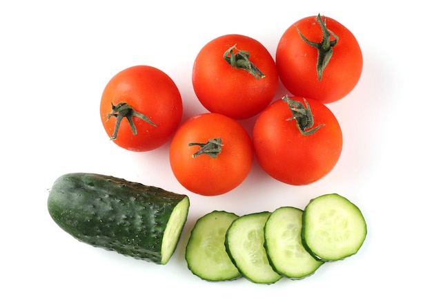 Tomatoes and cucumbers isolate top view