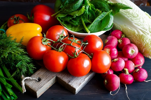 Tomatoes, cucumbers, peppers, radishes, onions and herbs