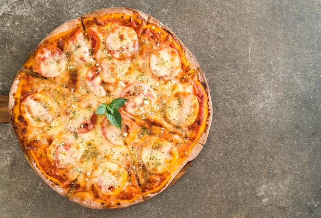 tomatoes pizza on table 