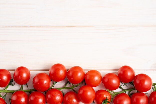 Tomatoes on a white wooden table