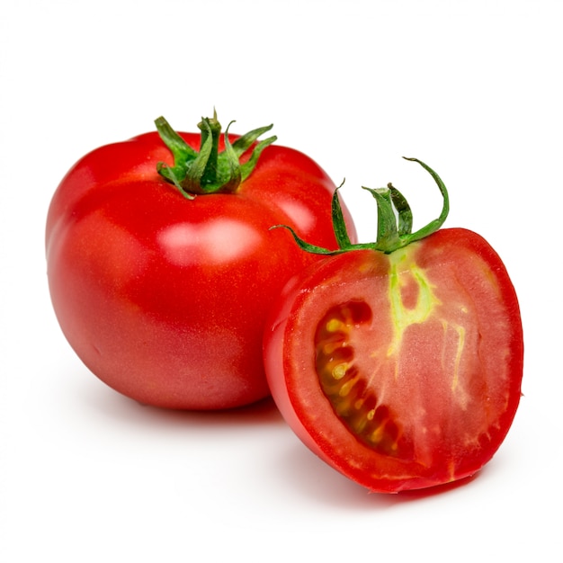 Tomatoes. Whole and a half isolated on white