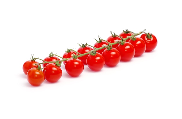 Tomatoes with green leaves isolated on white background