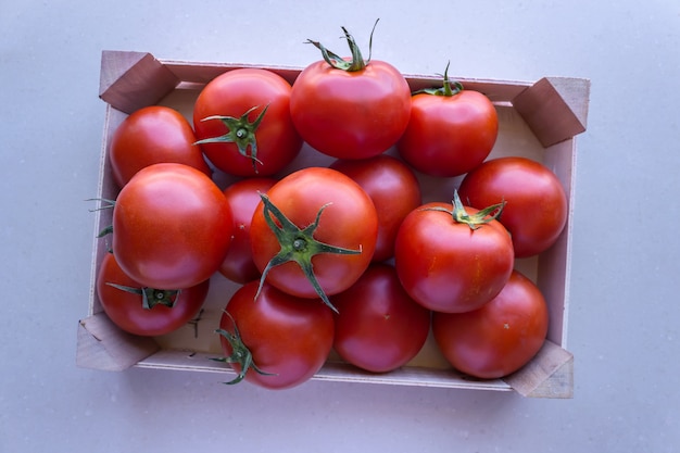 Tomatoes in a wooden crate