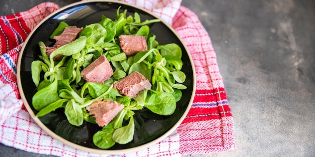 tongue salad green leaves pork mix cuisine fresh healthy meal food snack diet on the table