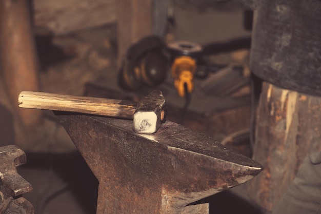 Tools for metal hammer on the anvil in the smithy