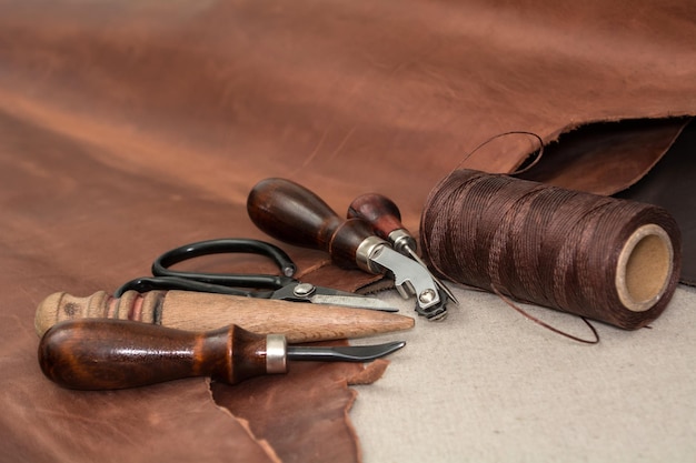 Tools and pieces of brown leather Manufacture of goods