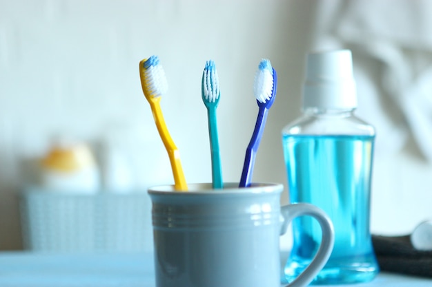 Toothbrushes and oral cleaners on the table