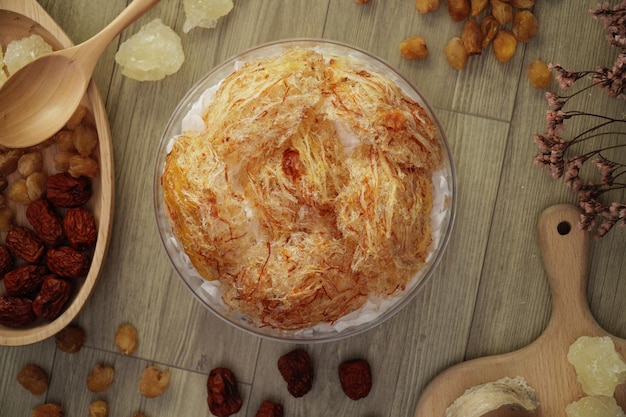 Top-down photo of bird's nest bowl on a wooden background