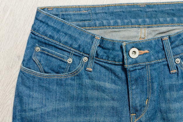 Top part of jeans, close-up.