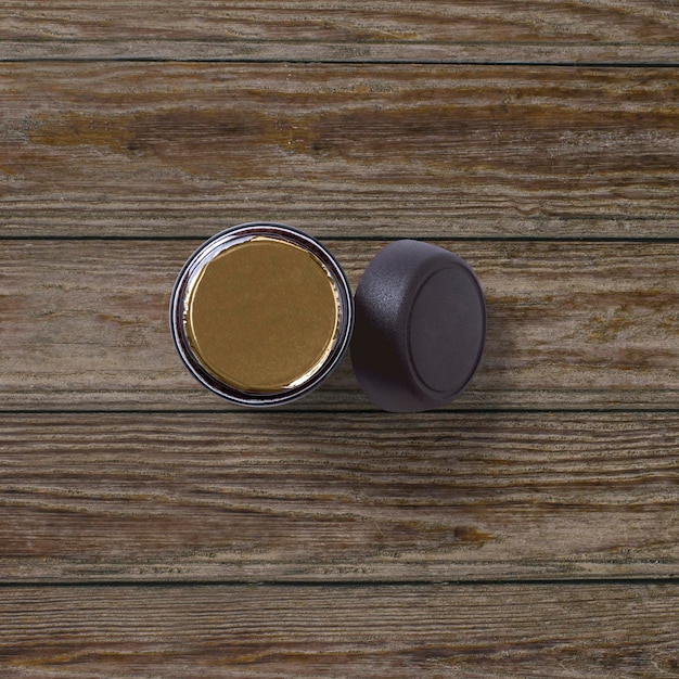 Top up view of Jar instant coffee isolated on wooden background