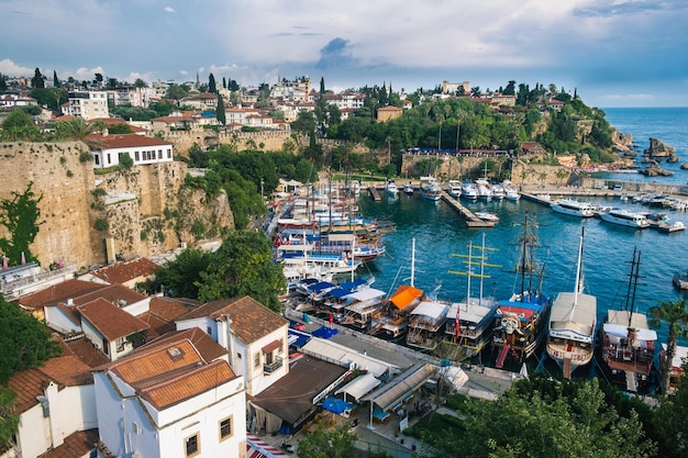 Top view of Antalya city and harbour with moored ships