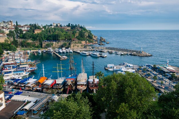 Top view of Antalya city and harbour with moored ships