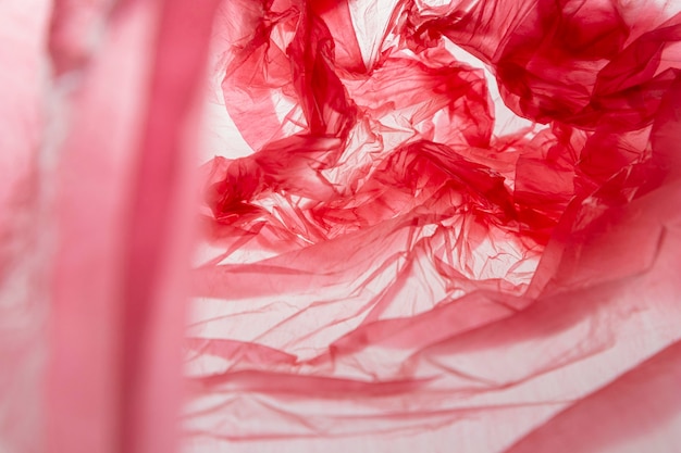 Top view arrangement of red plastic bags