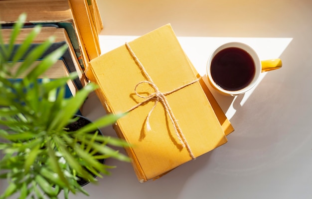 Top view arrangement with book and cup