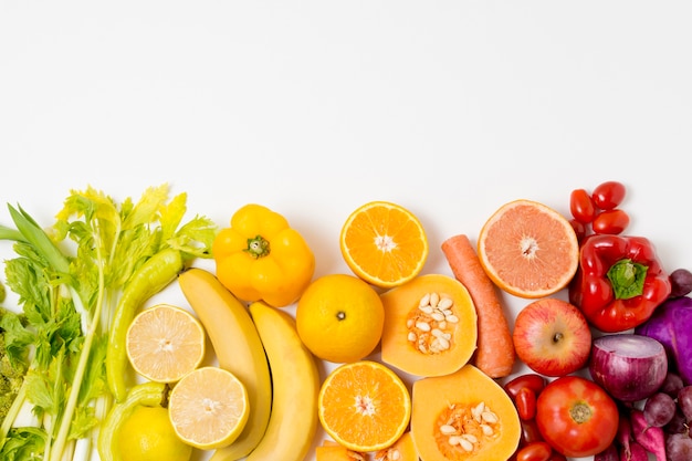 Top view assortment of fresh fruits with copy space