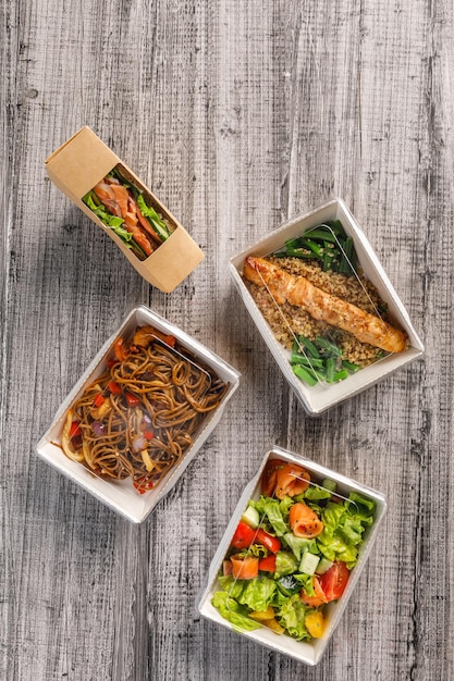 Top view of assortment of healthy food to go Healthy food in takeaway containers