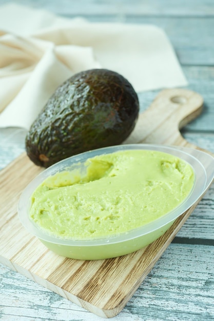 Top view of avocado spread on a chopping board