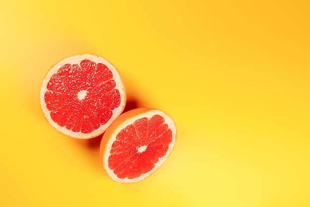 Top view background of sliced fresh grapefruit