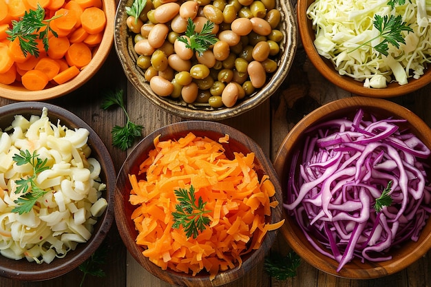 Top view beans pickled cabbage cut beet on oval plates