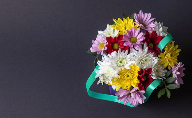 Top view of beautiful colorful bouquet of flowers isolated on grey background