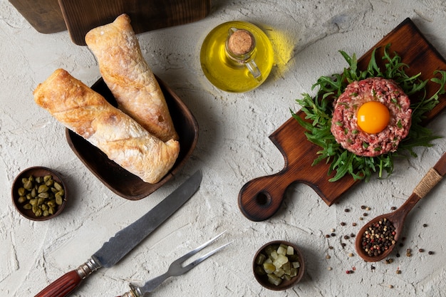 Top view beef steak tartar still life