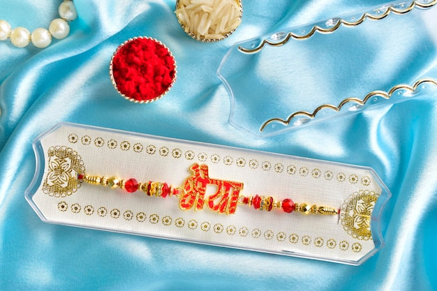 Top view of bhaiya rakhi on blue background