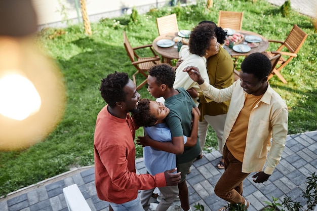 Top view at big african american family having fun during summer party outdoors