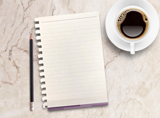 Top view blank paperpencil and coffee mug on marble background