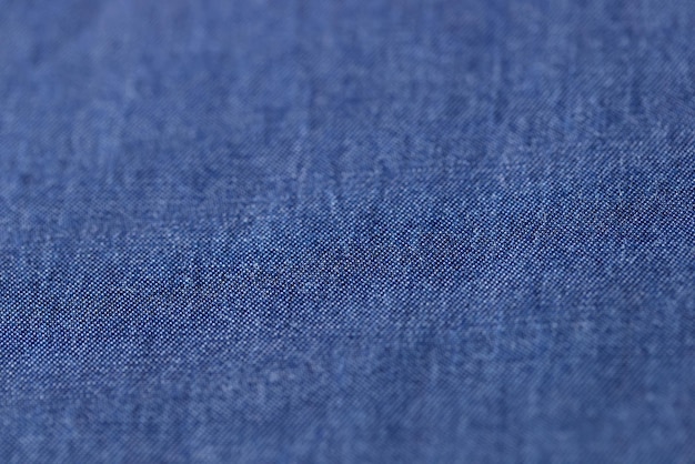 Top view of blue smooth fabric cloth texture background for design art work pattern of cotton