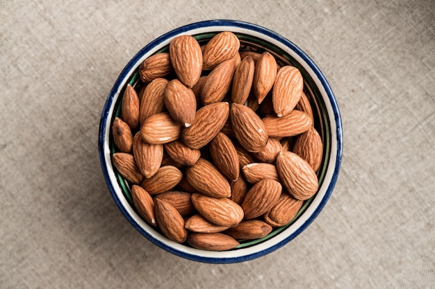 A top view at the bowl with almonds