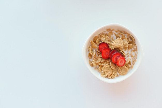 Top view of breakfast cereal in a bowl on table