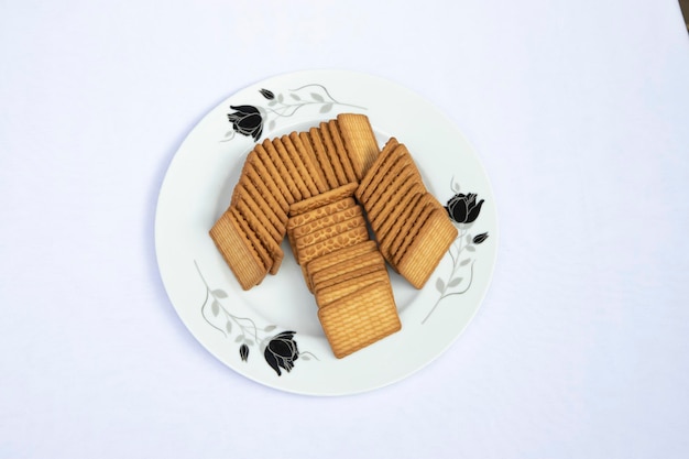 Top View Brownwheat Biscuits in the Plate isolated Background