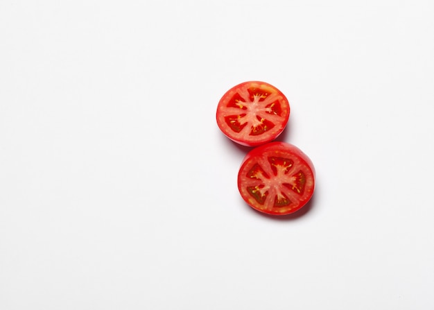 Top view of bunch of fresh tomatoes isolated