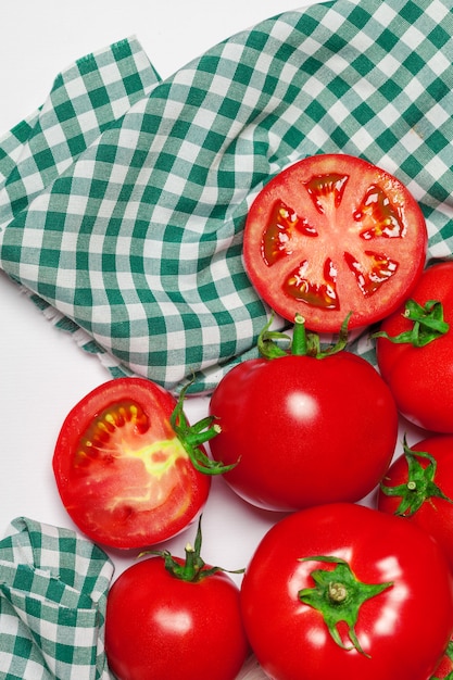 Top view of bunch of fresh tomatoes isolated