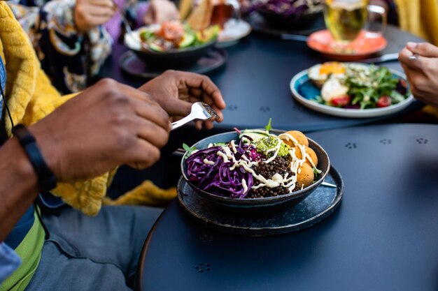 Top view cafe table with bowls of salad