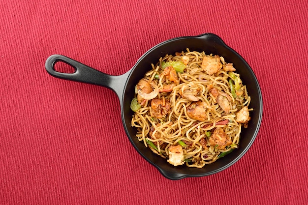 Top view of chicken noodles in pan