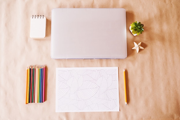 Top view of children modern desk set up.