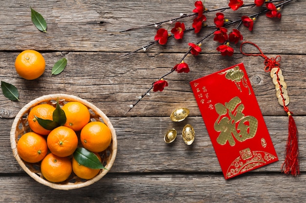 Top view of chinese new year concept on wooden table