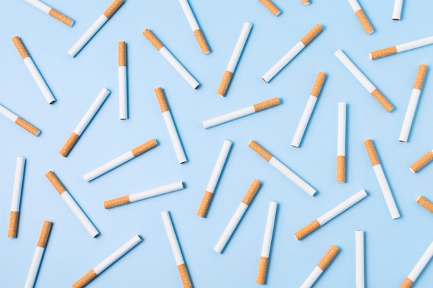 Top view cigarettes on blue background