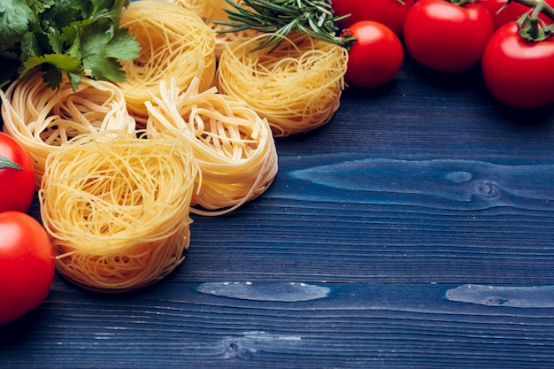 Top view closeup detail of tagliatelle Italian pasta 