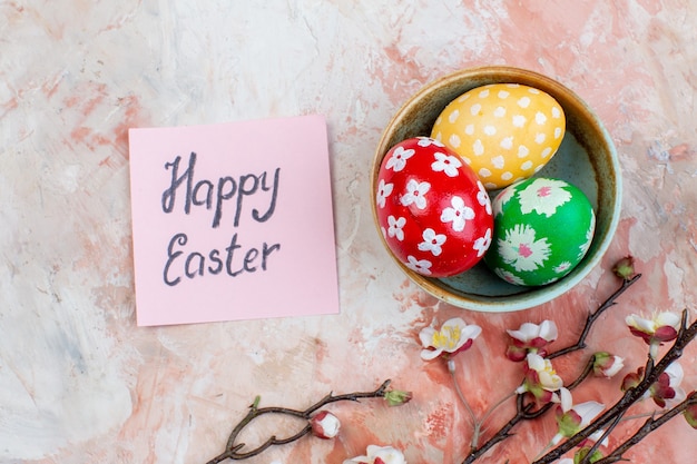 top view colored easter eggs inside plate on light background horizontal holiday colourful ornate spring easter