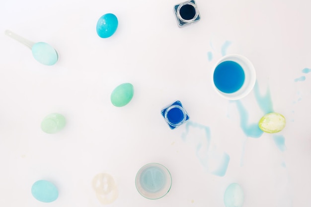 Top view of colorful easter eggs on white background