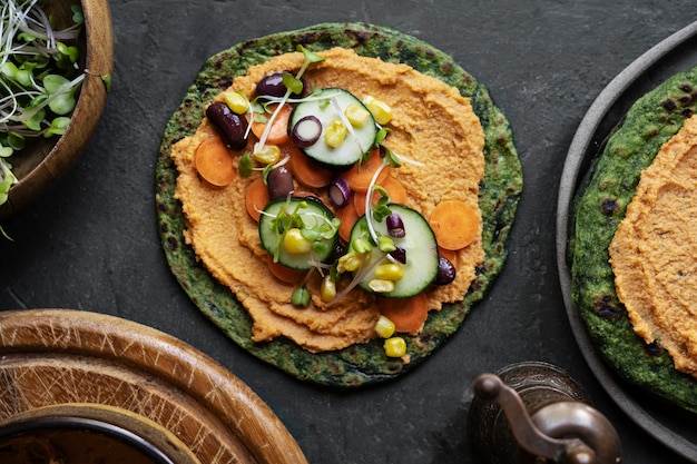 Top view over colorful hummus