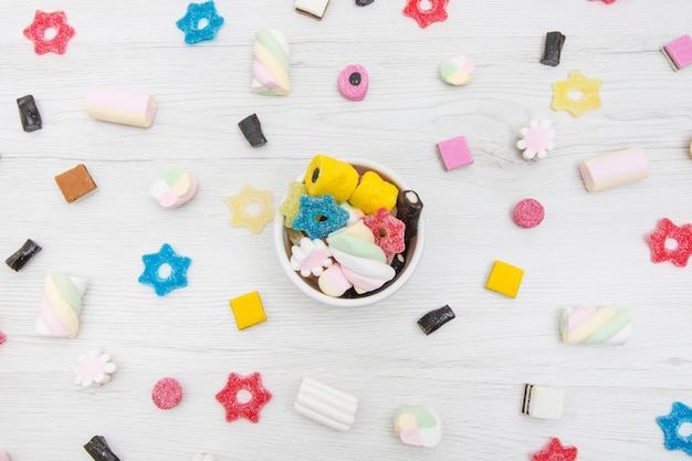 Top view of colorful liquorice allsorts ,jelly candy and marshmallow